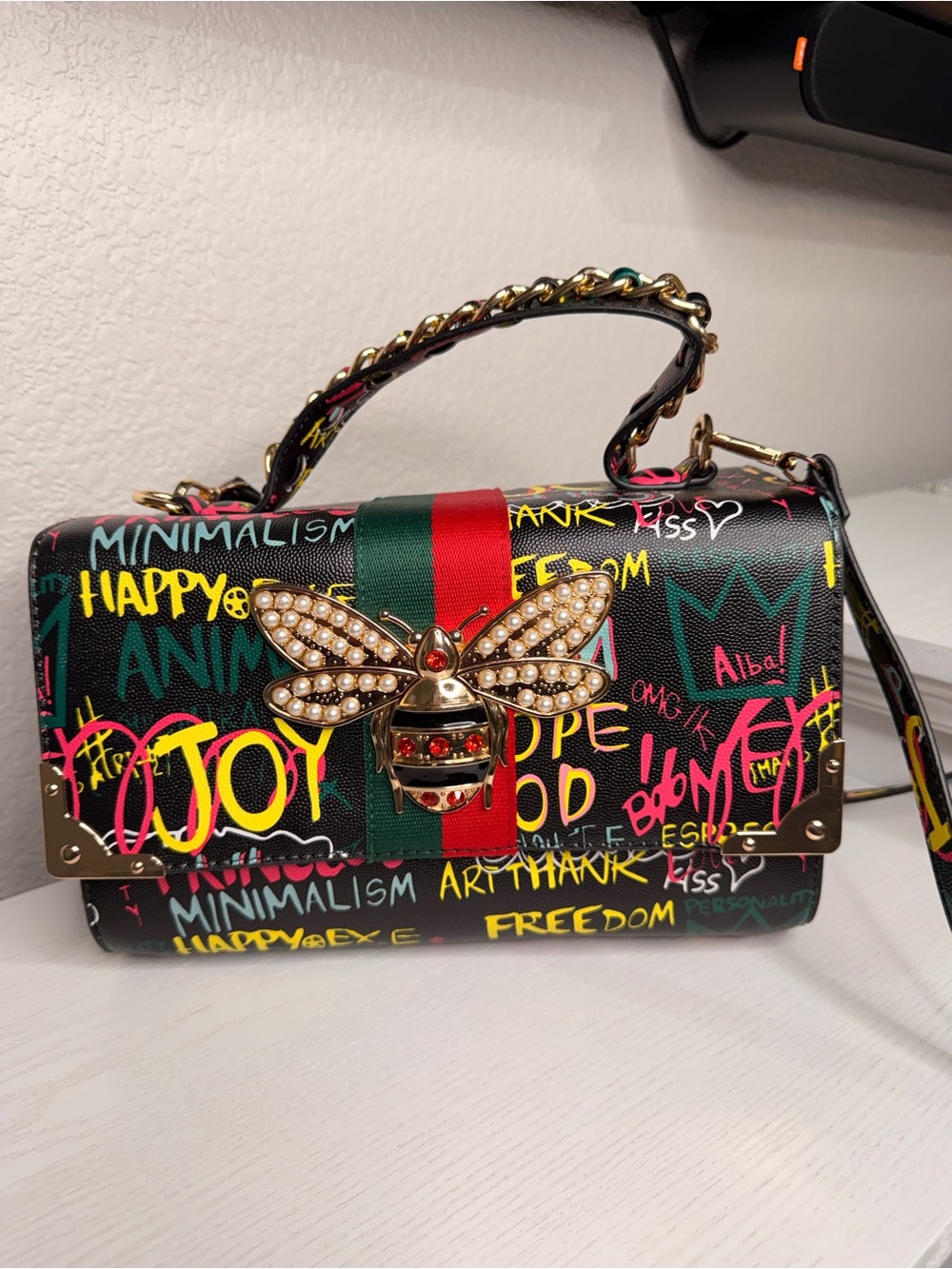 Black Graffiti Bee Accent Crossbody Bag with Red & Green Stripe